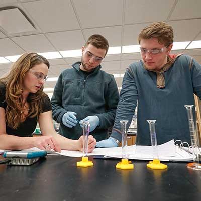 students working on an experiment in class